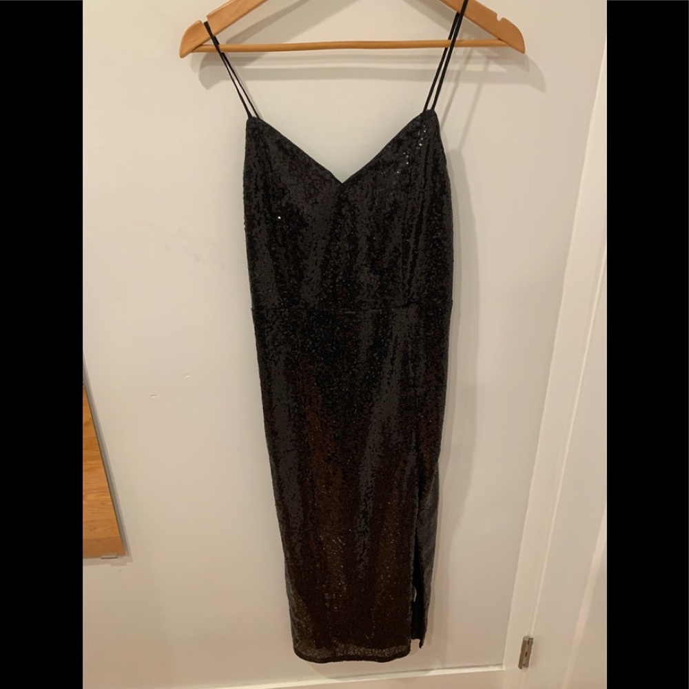 Black sequined below the new dress with slight slit